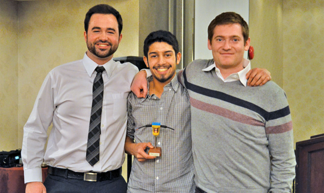 Mike Smorodin (left), award winner Johan Gilchrist (centre) and Aaron Foyer (right) at the WIUGC.